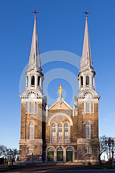 Vertical frontal view of the monumental Notre-Dame-de-lÃ¢â¬â¢Annonciation church in LÃ¢â¬â¢Ancienne-Lorette photo